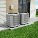 Home heat pumps outside the modern house, installed near the wall.